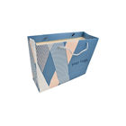 Carry Custom Paper Shopping Bags 250g Embossed Promotional With Matched PP Rope Handle